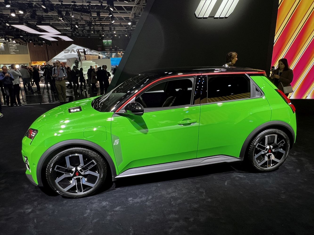 Electric compact hatchback with black roof and modern alloy wheels