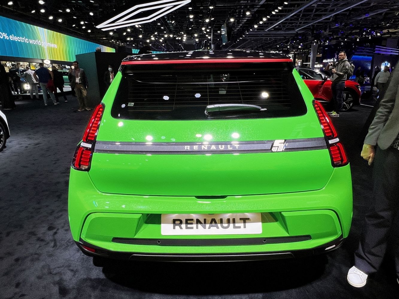 Compact hatchback rear with horizontal light strip and badge