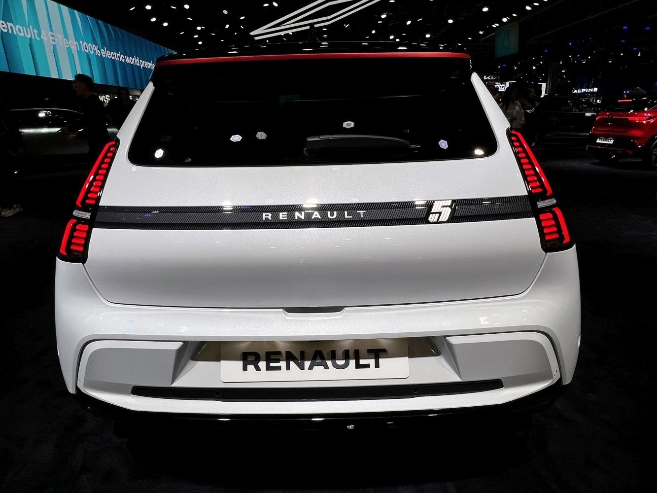 Rear view with vertical LED tail lights and wide glass window