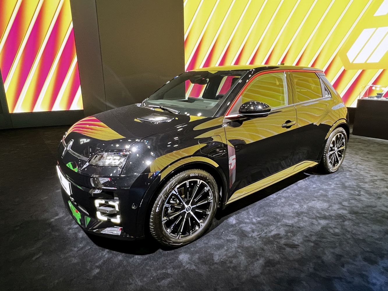 Front-side view of 2024 electric hatchback with LED headlights and alloy wheels