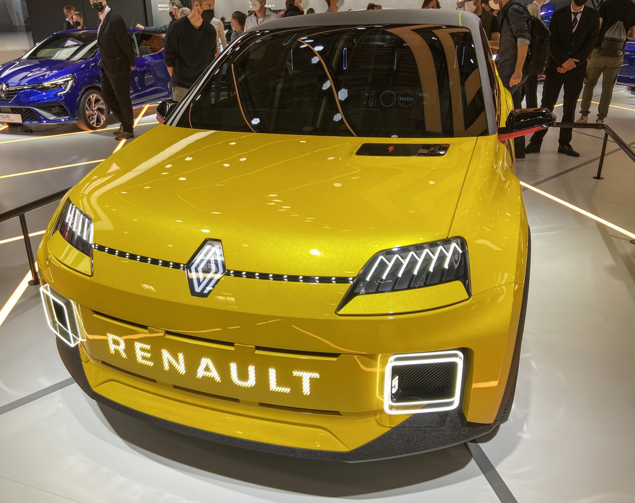 Yellow front view with distinctive LED headlights and digital illuminated Renault branding