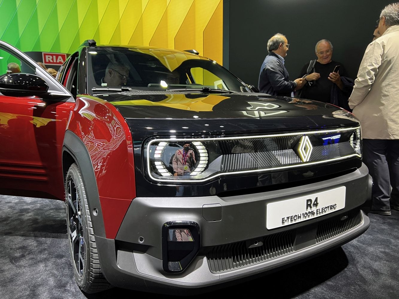 Electric vehicle front with LED headlights and bold grille design
