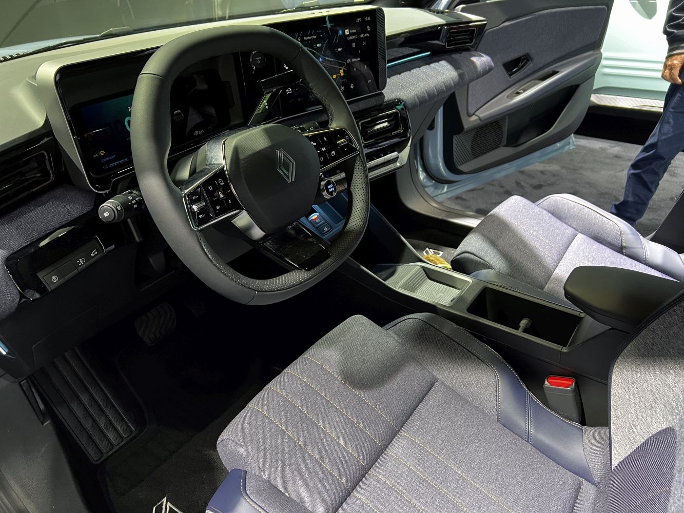 Modern car interior with digital dashboard and touchscreen display