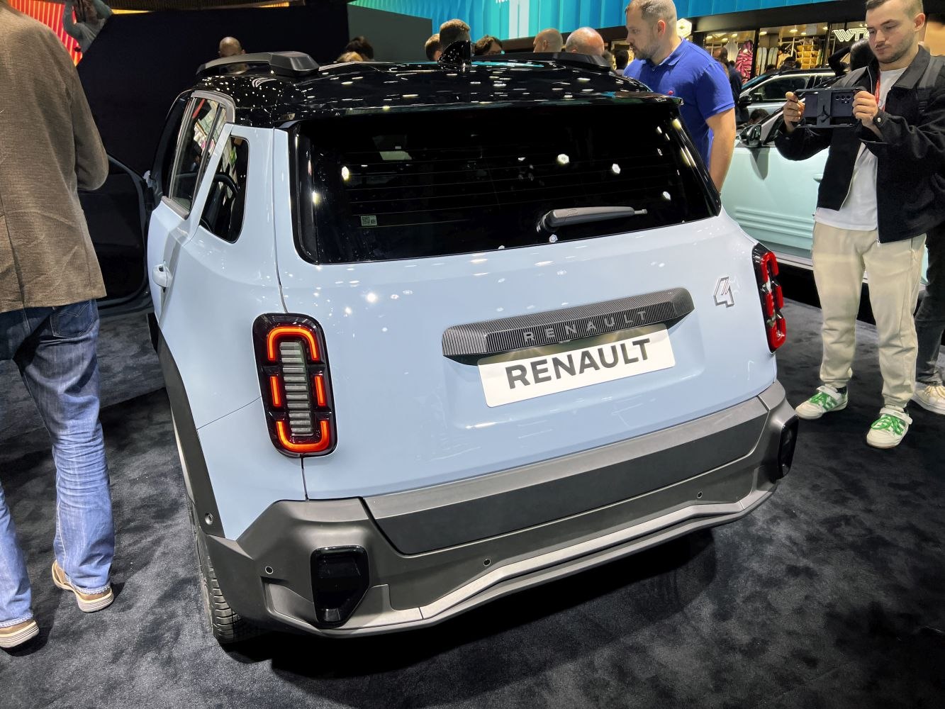Rear view with modern rectangular LED tail lights and black roof contrast