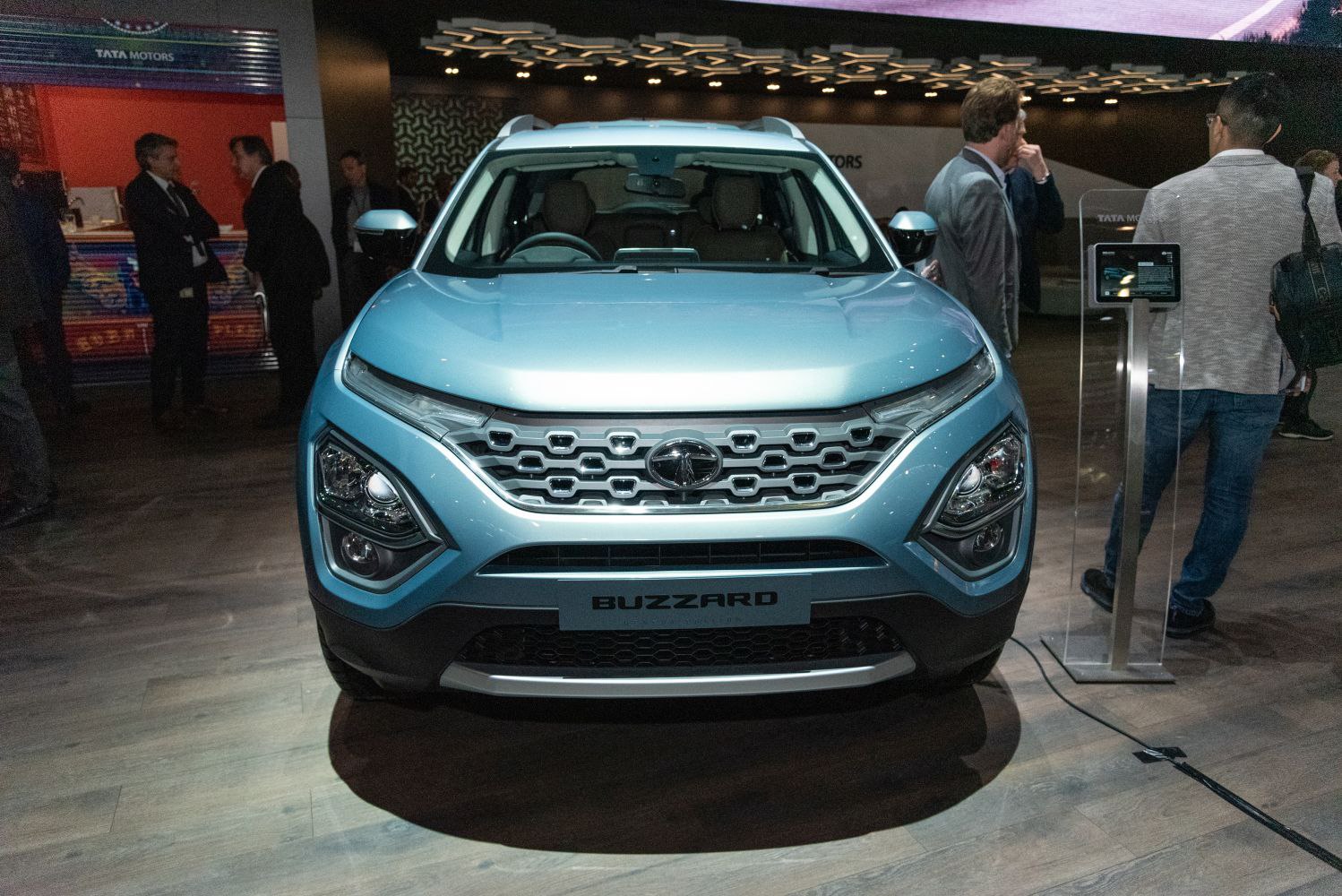 Front view of SUV with distinctive grille and multi-layered headlights