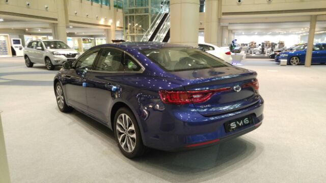 Rear view of a sleek modern sedan with distinctive tail lights