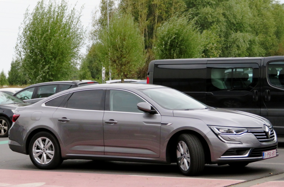 Side profile of a sleek mid-size sedan with alloy wheels and tinted windows