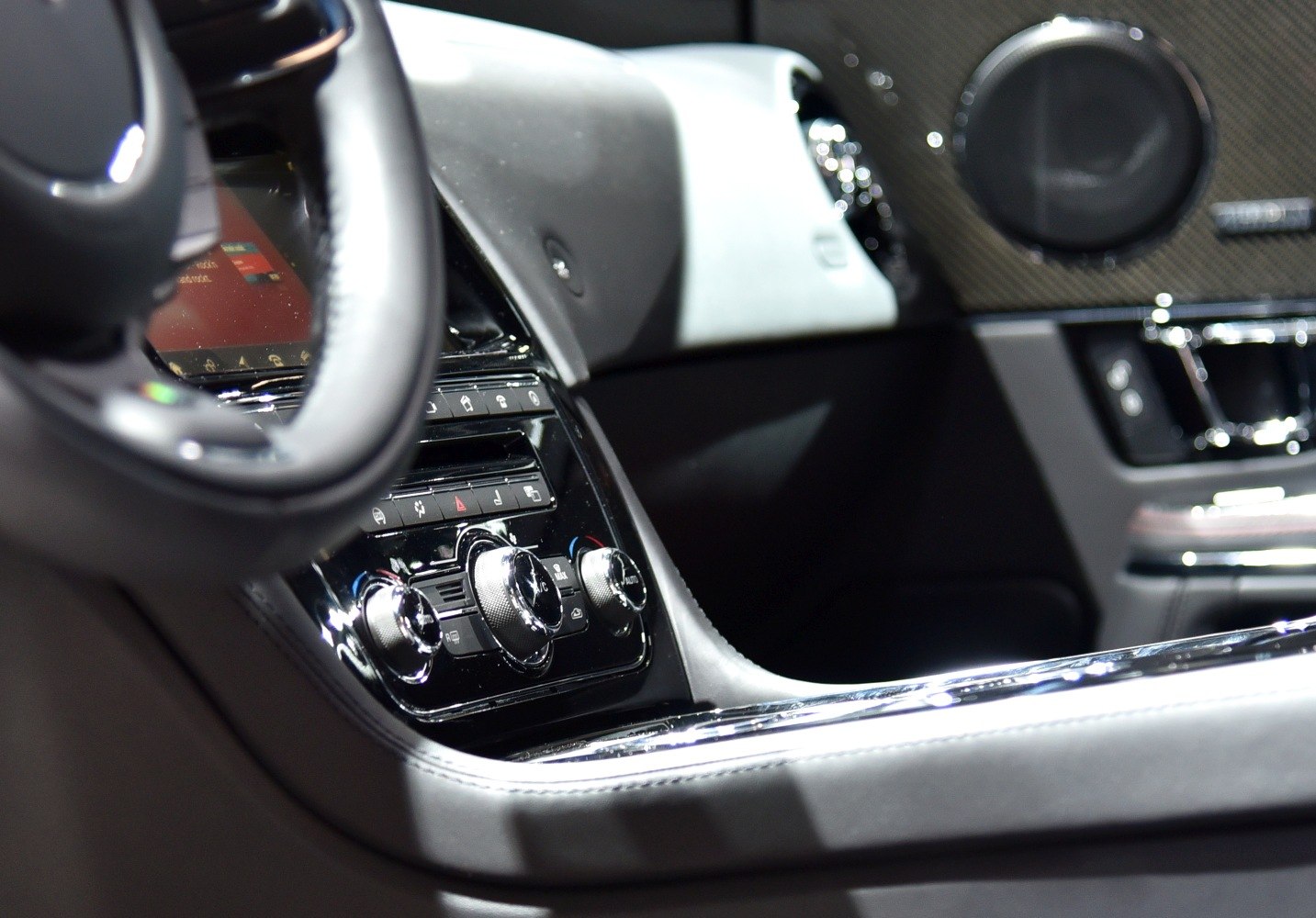 Interior climate control knobs and dashboard section close-up