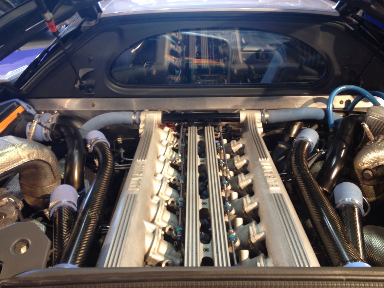 High-performance engine bay with distinctive intake and exhaust piping