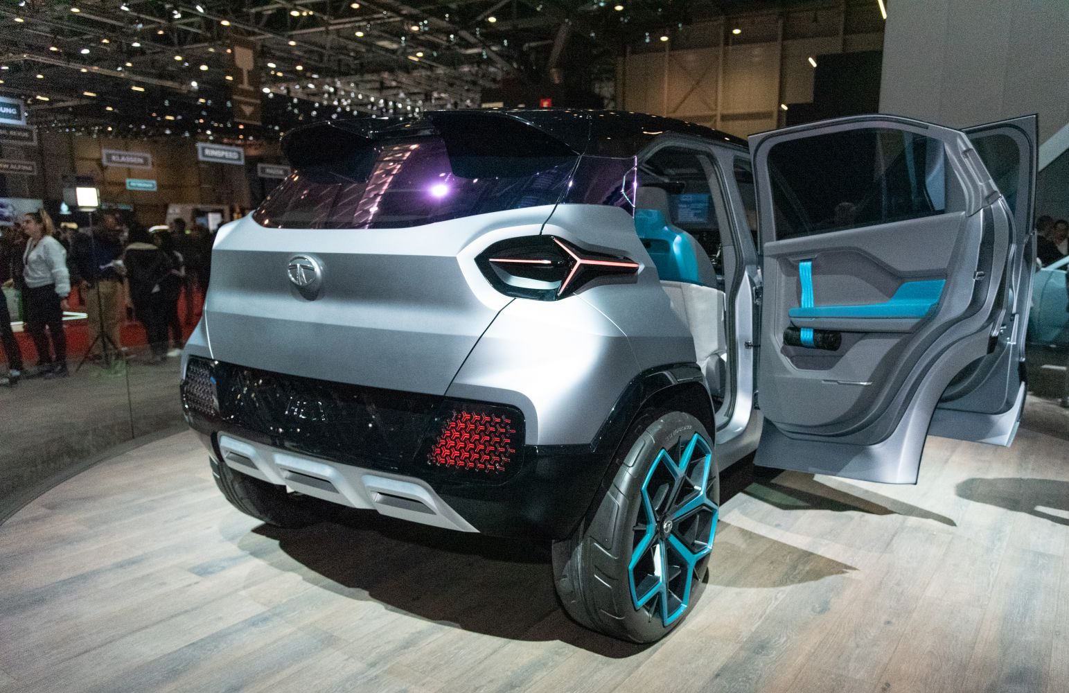Rear view with futuristic LED tail lights and open rear door