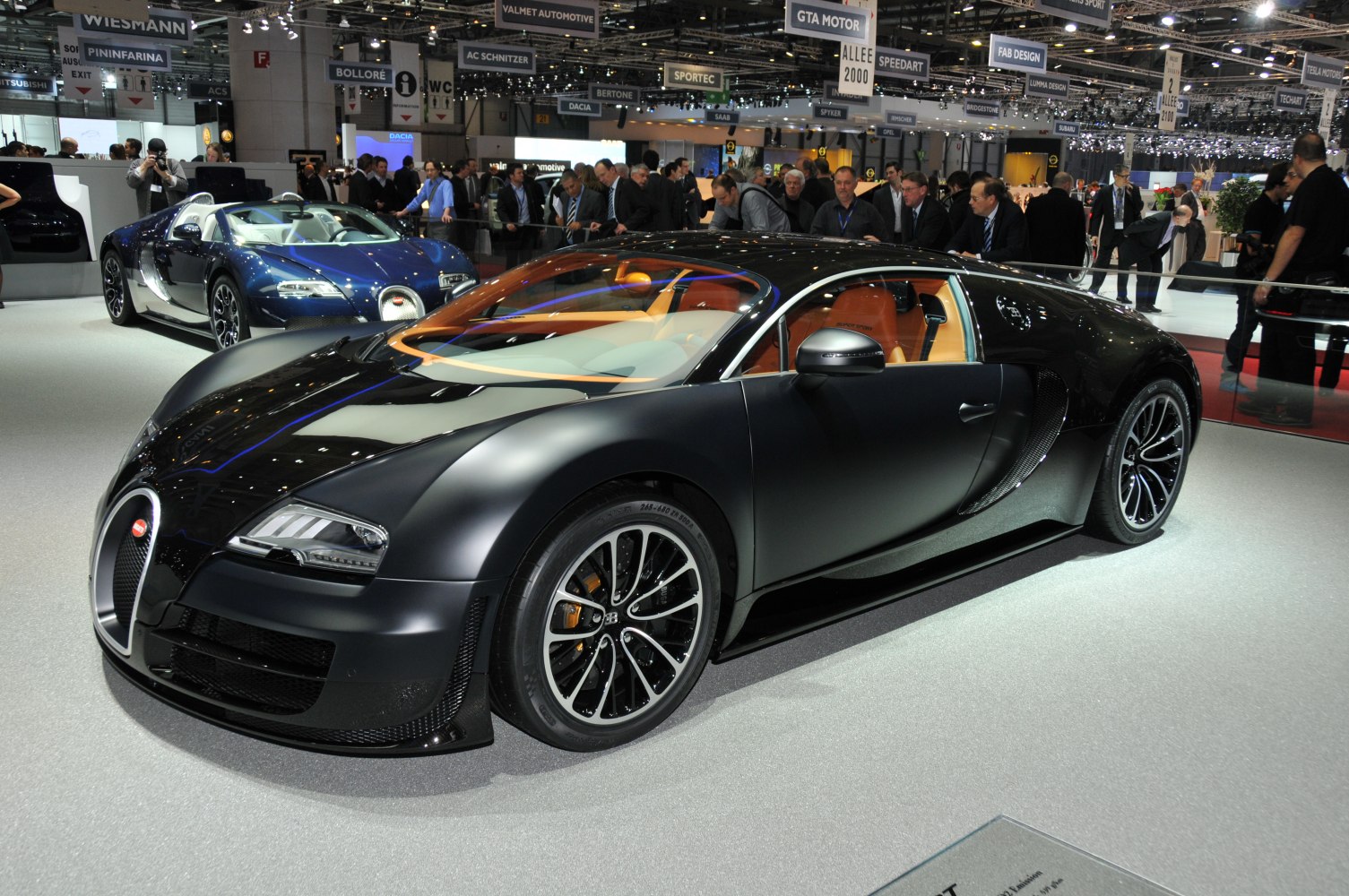 Matte black aerodynamic sports coupe with luxury interior
