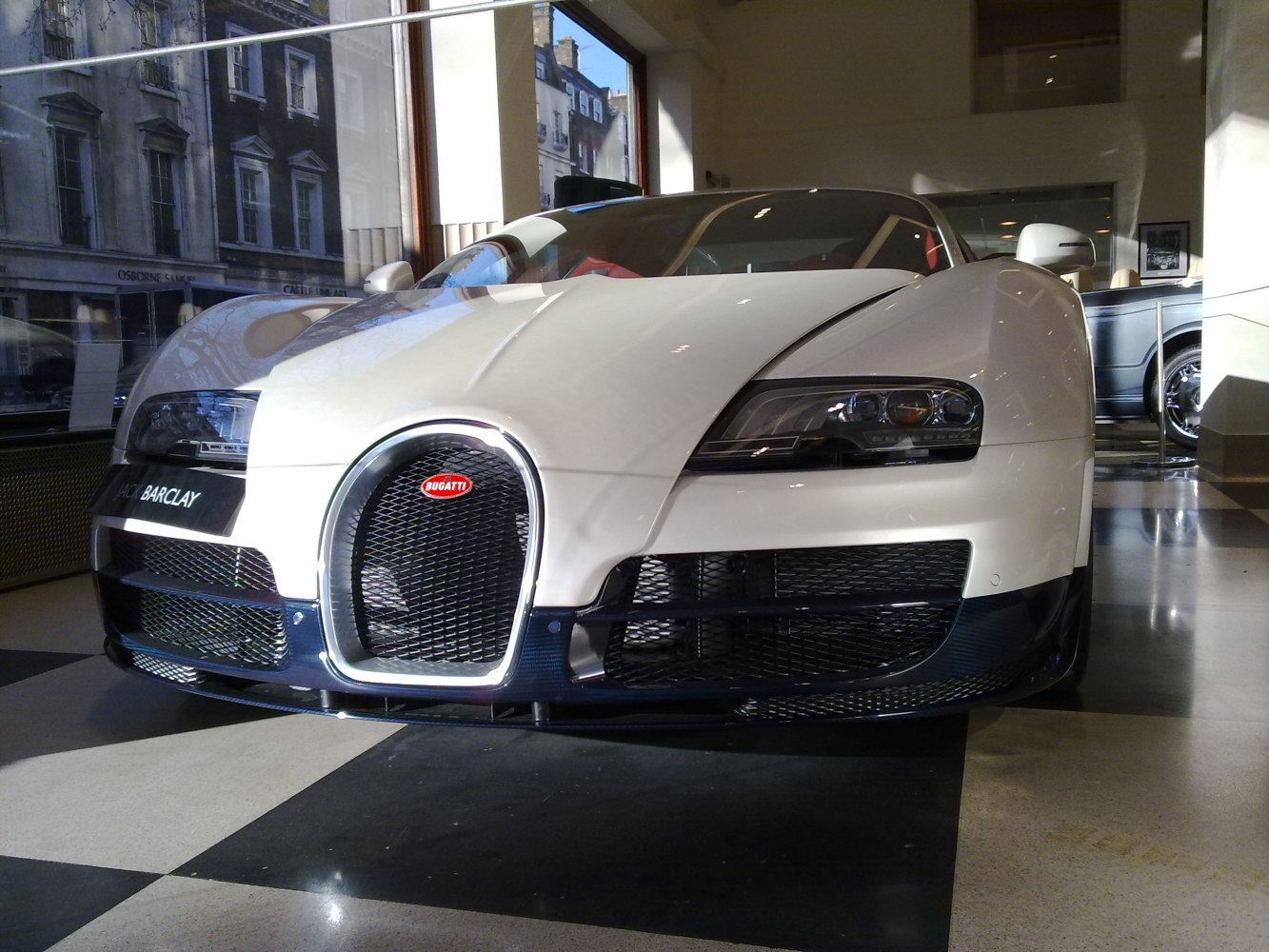 Dynamic front view with iconic grille and sleek headlights.