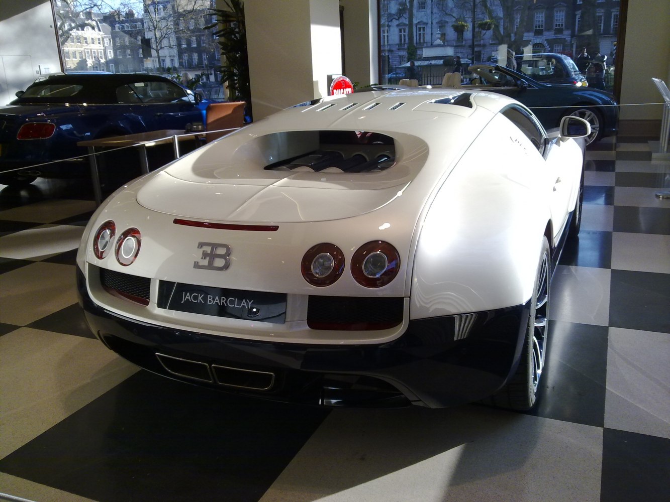 Distinctive rear circular taillights and engine window design