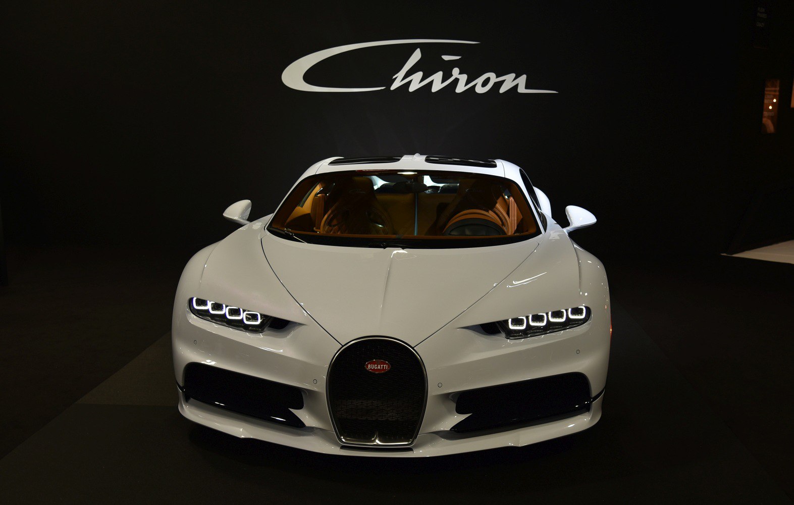 Front view featuring LED headlights and iconic grille.