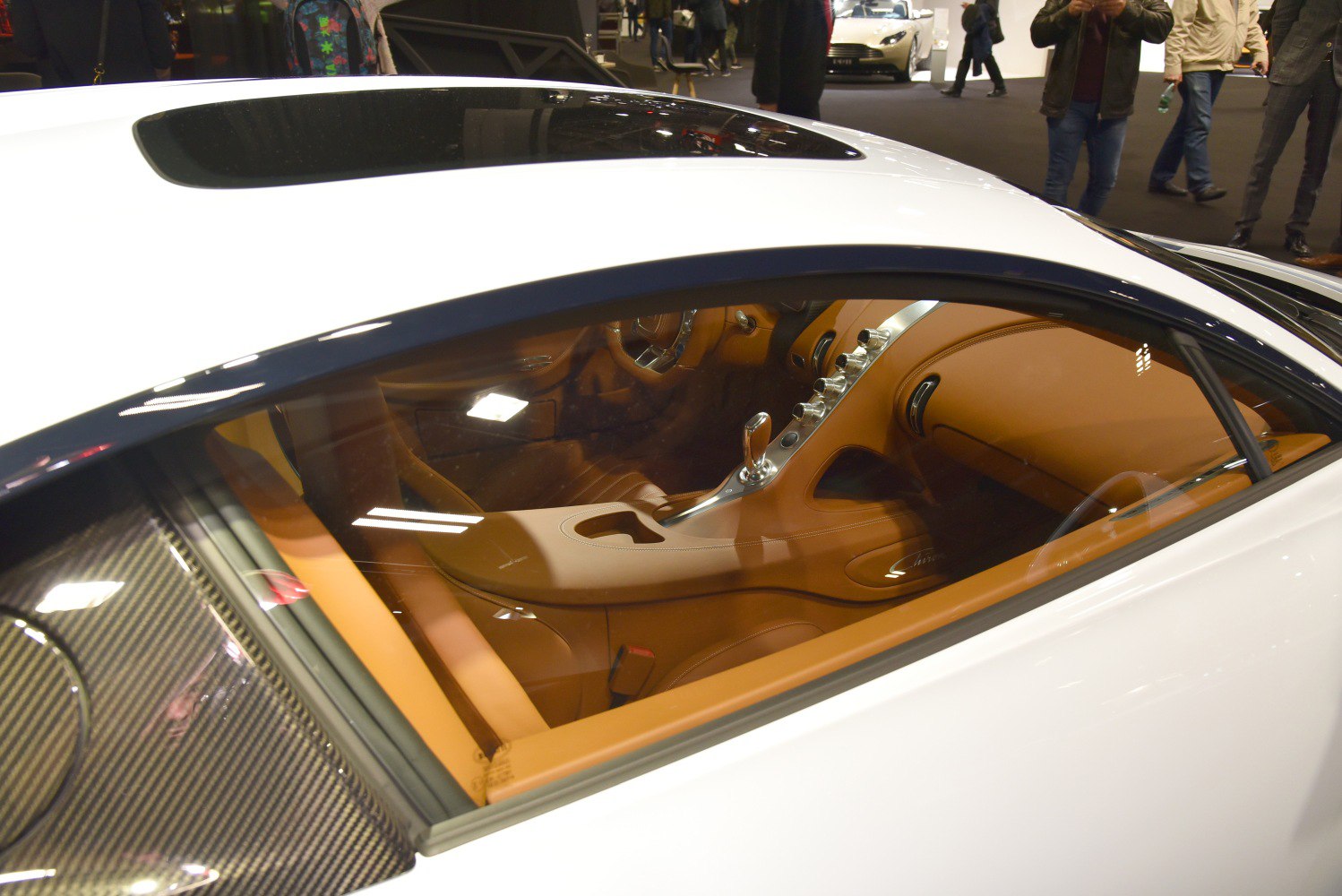 Luxury brown leather interior with sleek center console and gear selector