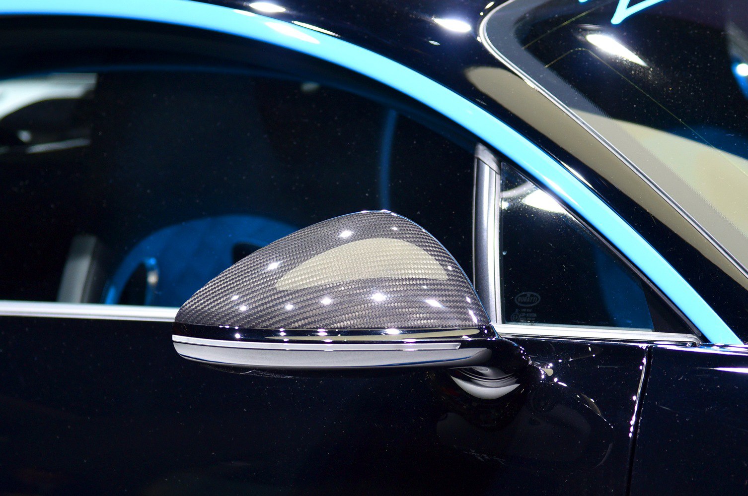 Carbon fiber side mirror with blue window trim