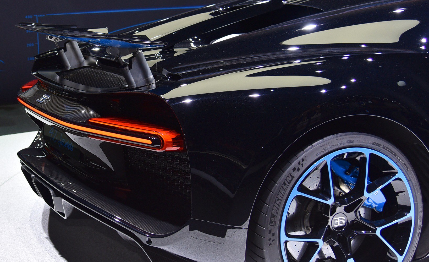 Rear active spoiler, LED taillight, and blue brake calipers