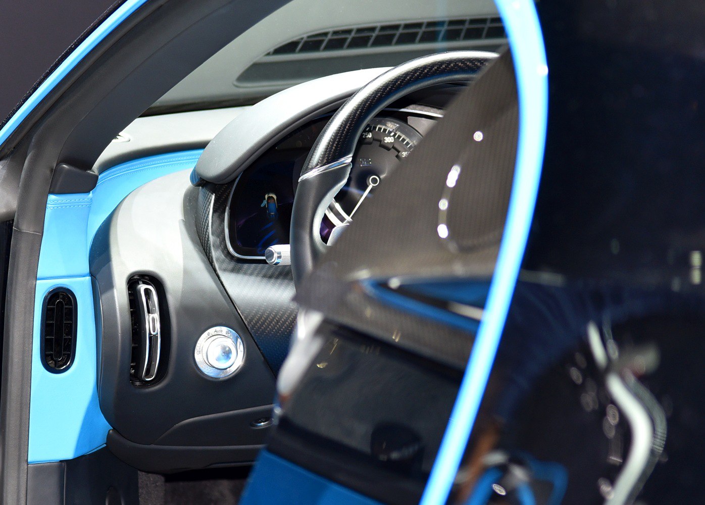 Luxury carbon fiber dashboard and steering wheel with speedometer