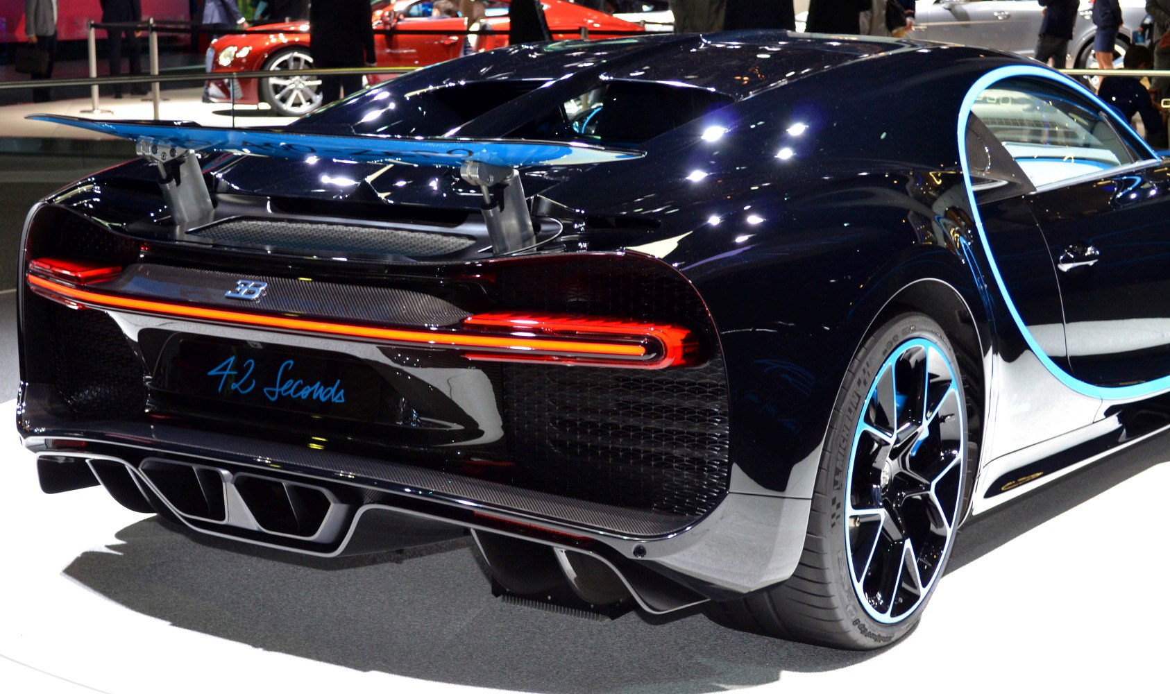 Rear view with active spoiler and carbon fiber diffuser.