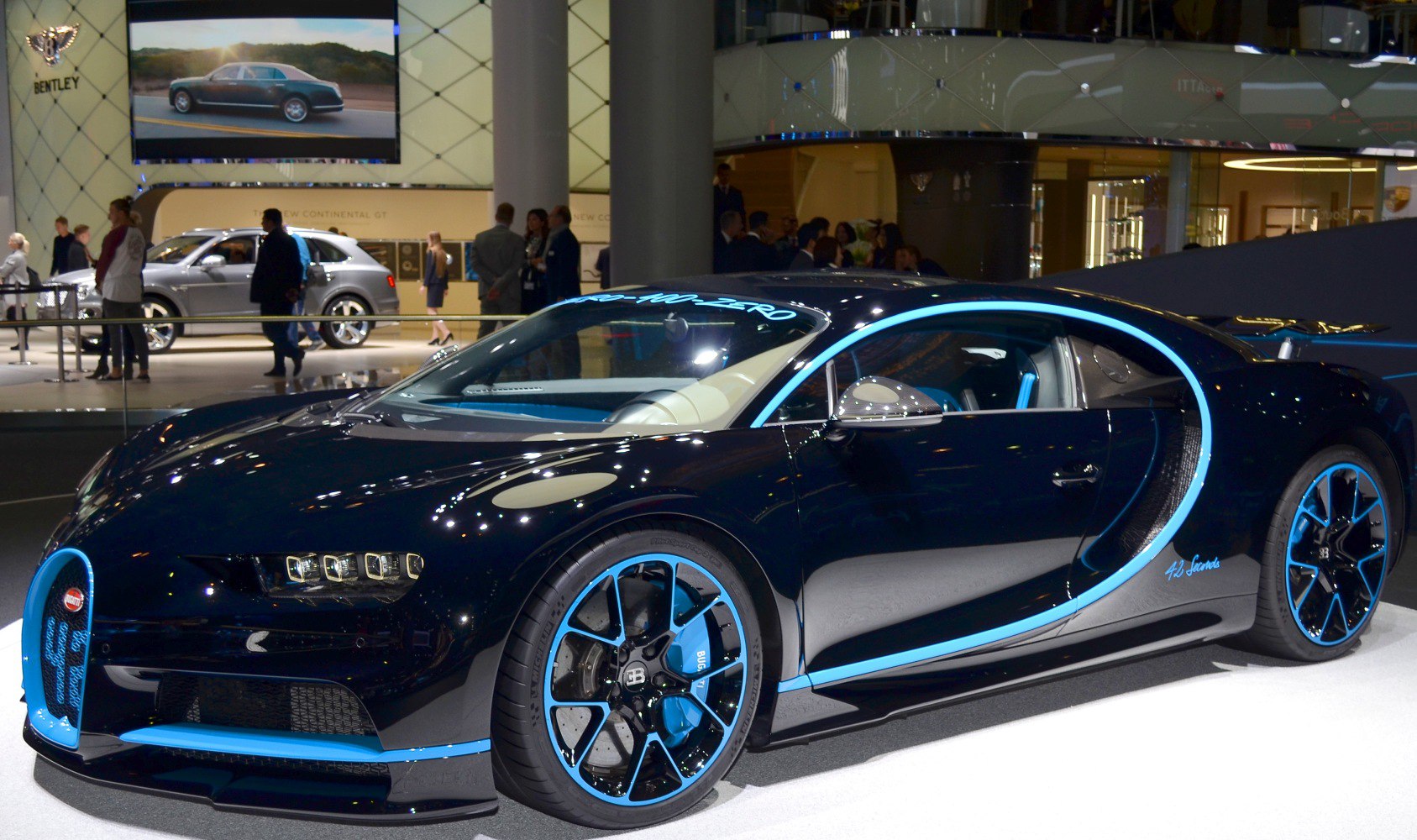 Luxury sports coupe with blue trim and multi-LED headlights