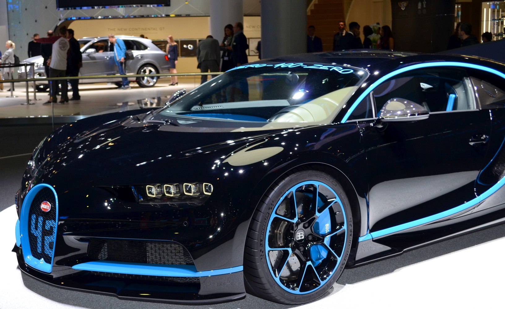 Front view with blue accented grille and wheels