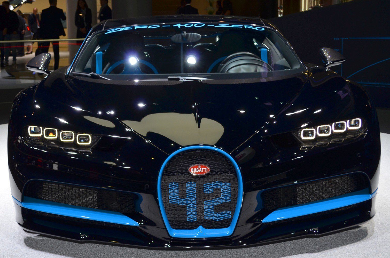 Front view with quad LED headlights and blue-accented grille