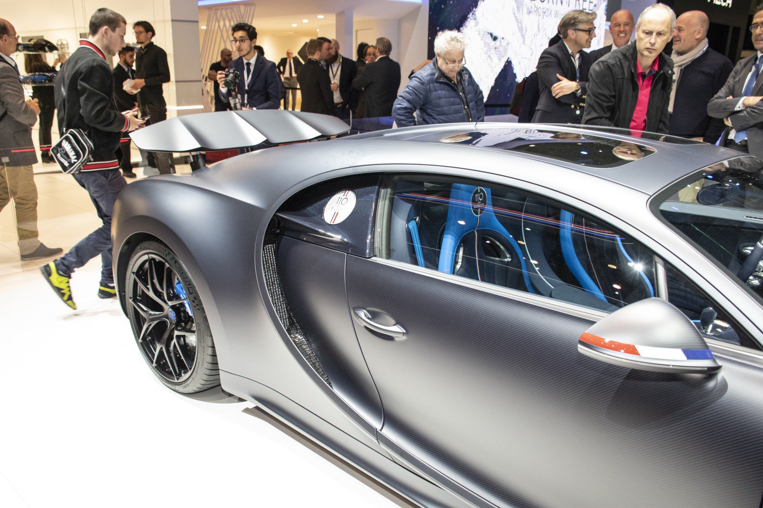 Carbon fiber side panel and aerodynamic rear wing with sports seats