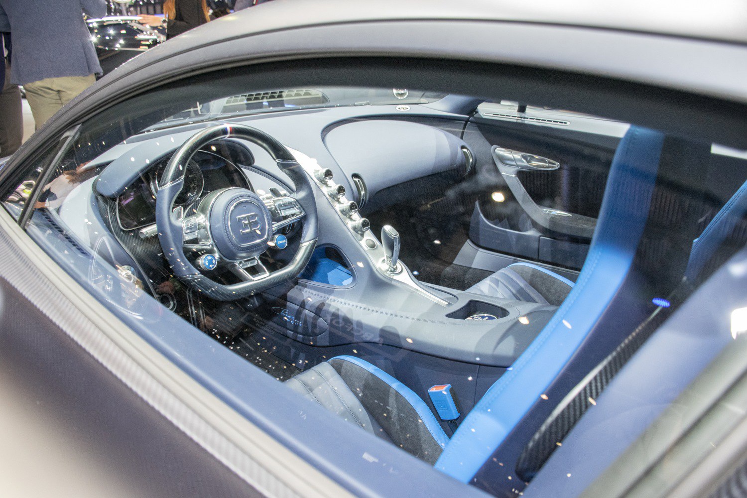 Luxury car interior with high-tech steering wheel and sleek dashboard design