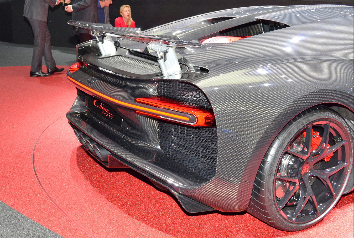 Active rear spoiler, quad exhaust, carbon fiber rear design