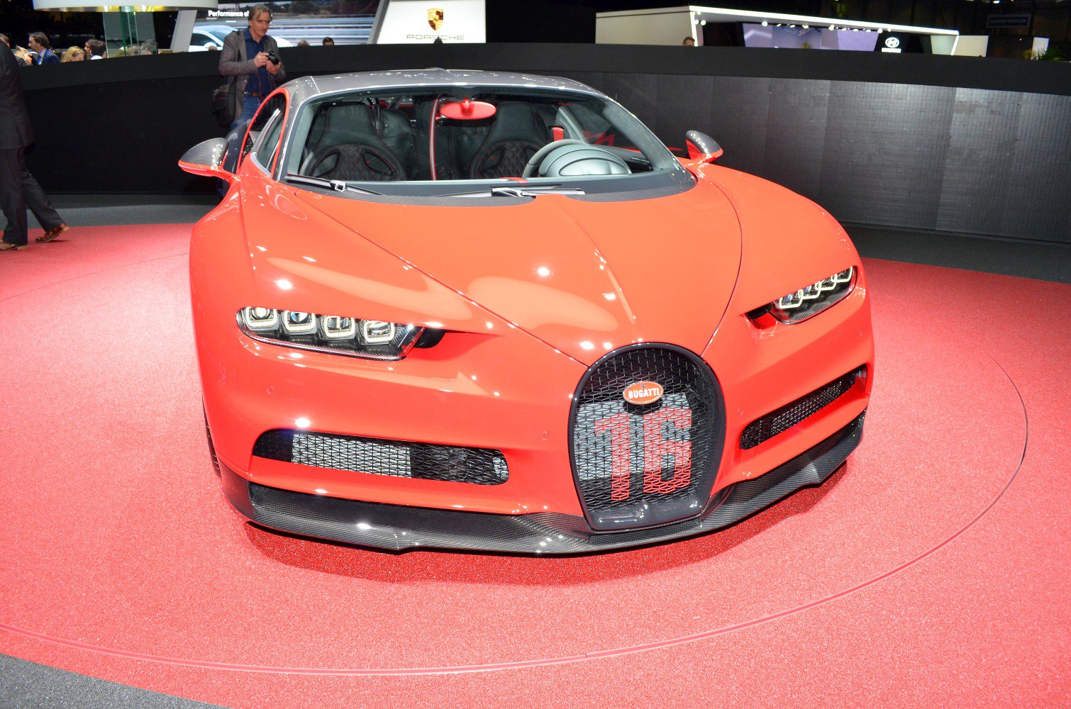 Front view with quad LED headlights and distinctive grille featuring number 16.