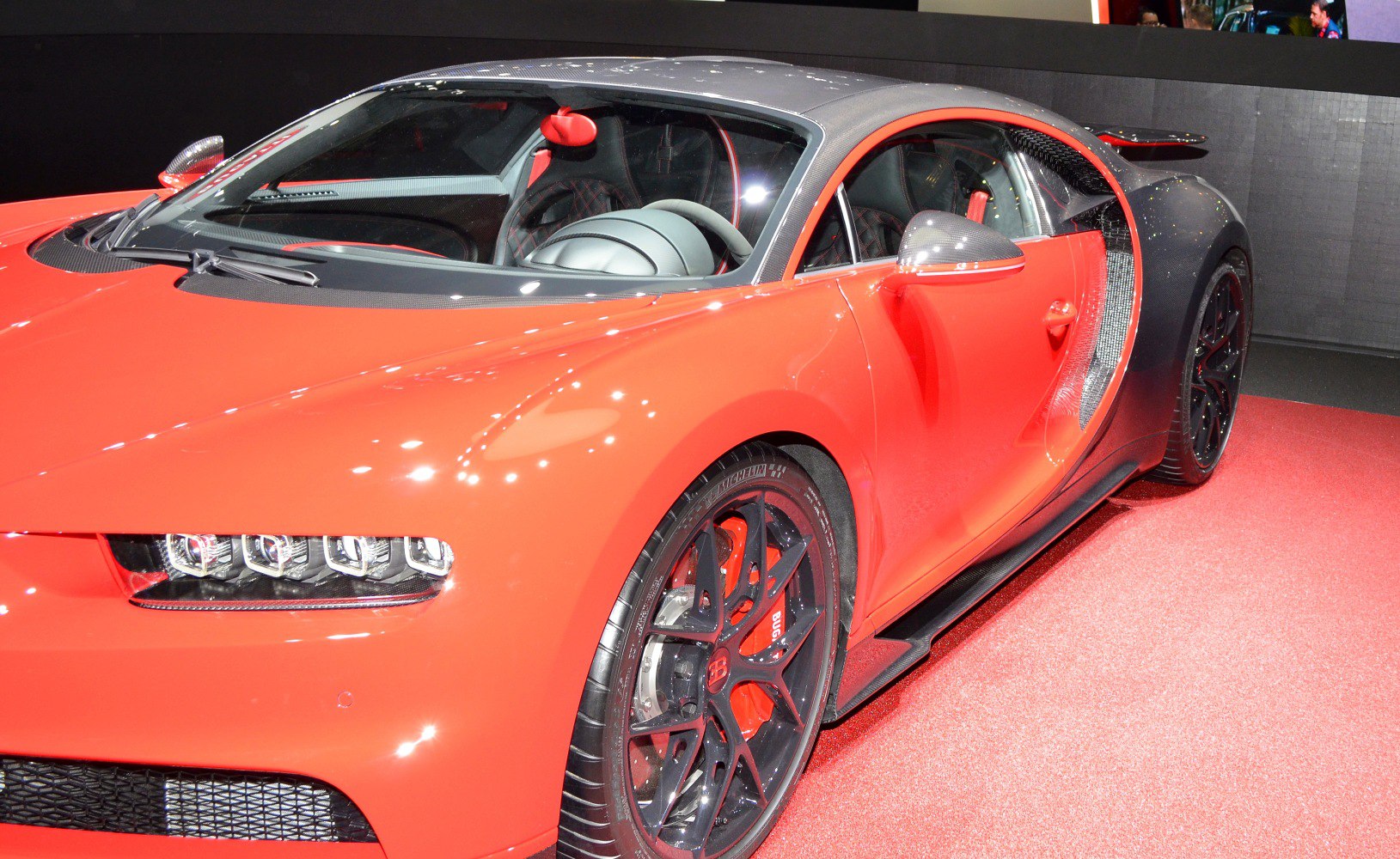 Front side view with carbon fiber accents and red detailing