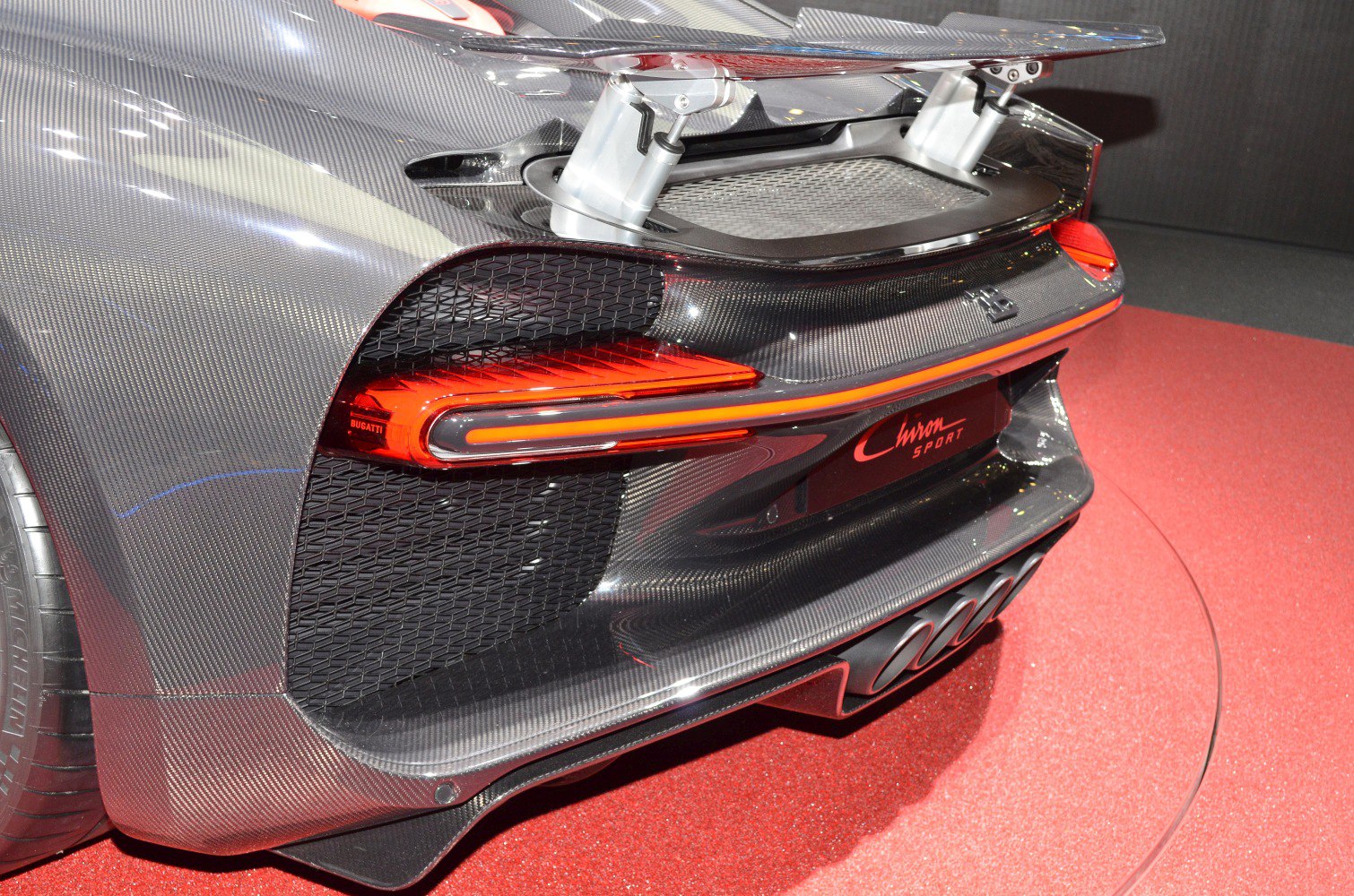 Carbon fiber rear with spoiler and distinct taillight design