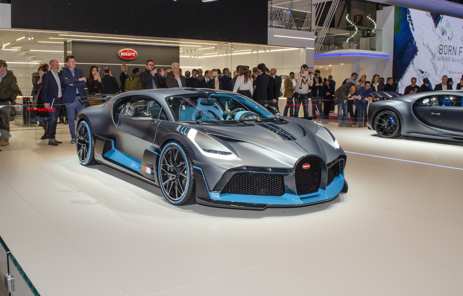 Front view with aerodynamic features and sporty multi-spoke wheels