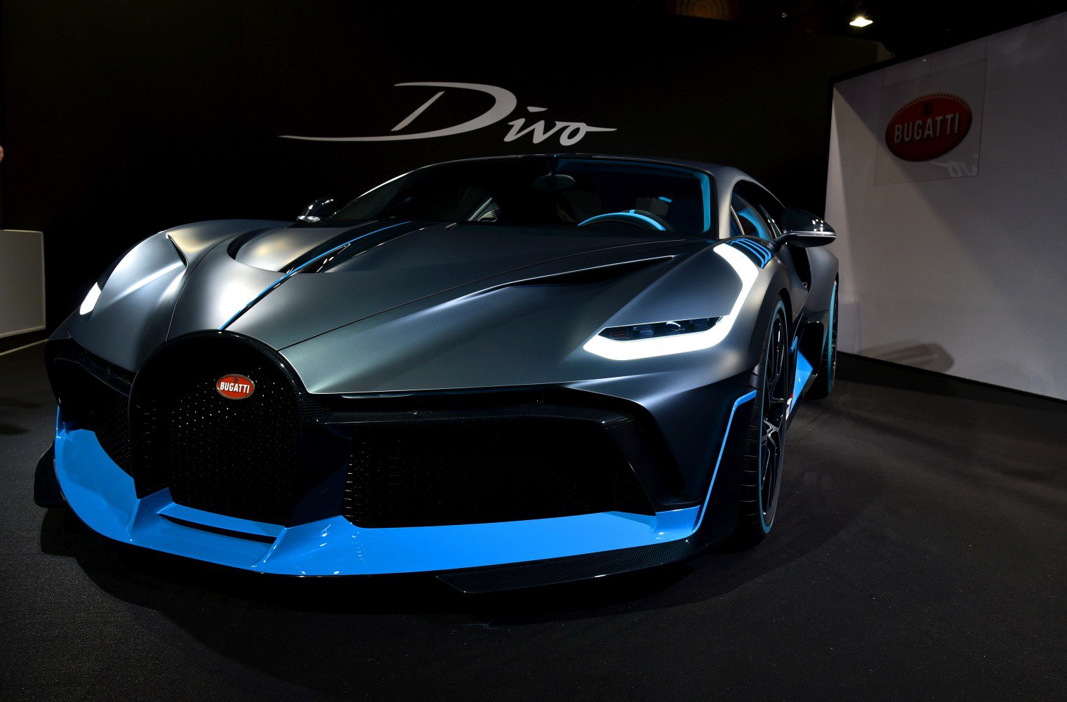 Aerodynamic front end with sharp LED headlights and blue accents