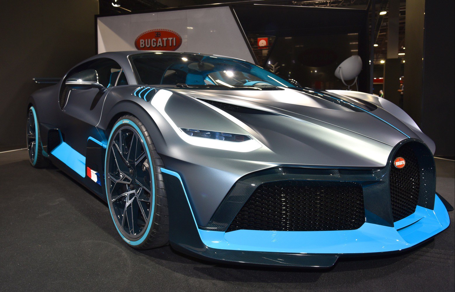 Sleek front design with aerodynamic features and detailed LED headlights