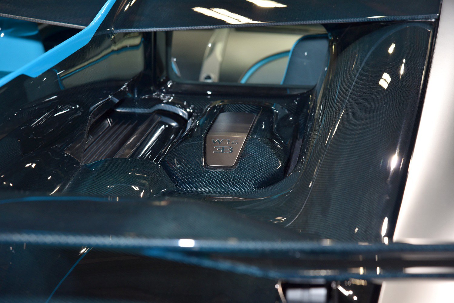 Detailed W16 engine cover with carbon fiber finish