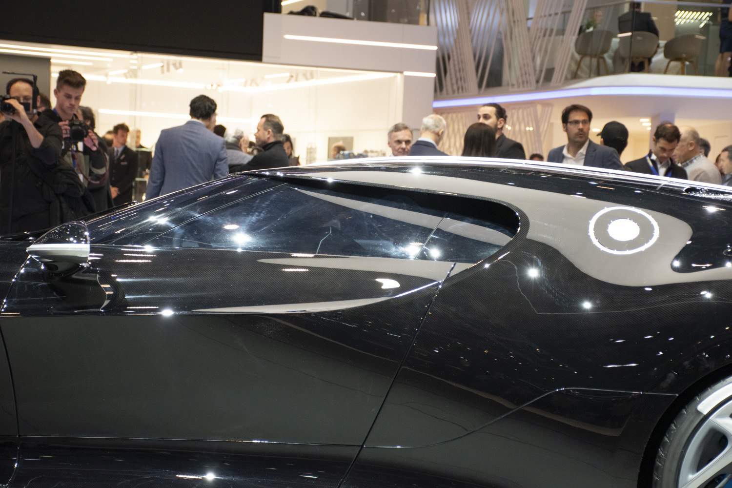 Aerodynamic carbon fiber side panel and sleek window design