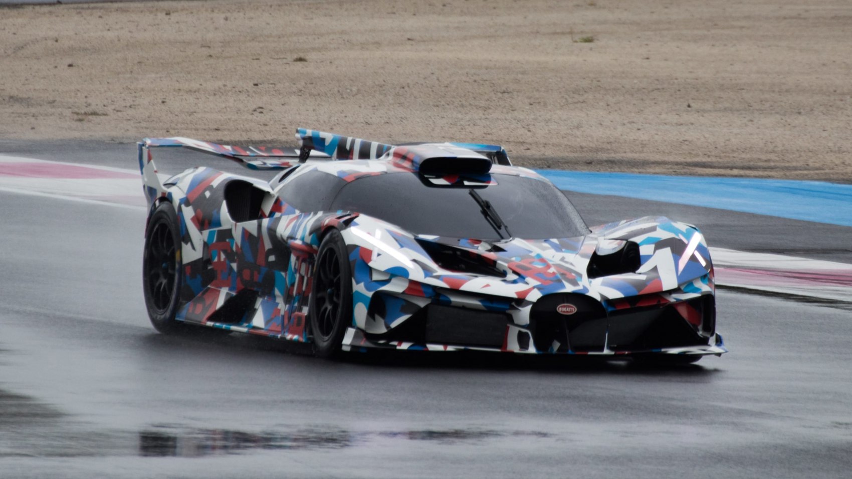 Aerodynamic prototype hypercar with aggressive styling and large rear wing