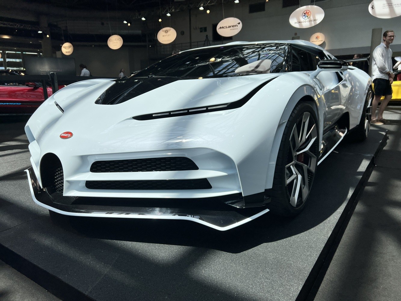 Aerodynamic front fascia and futuristic multi-spoke wheels