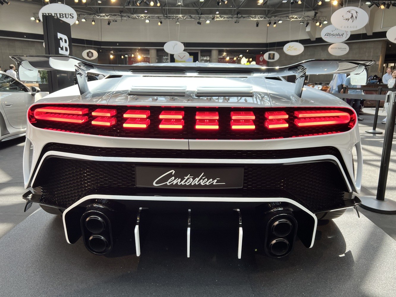Rear view with LED tail lights and dual exhaust system.