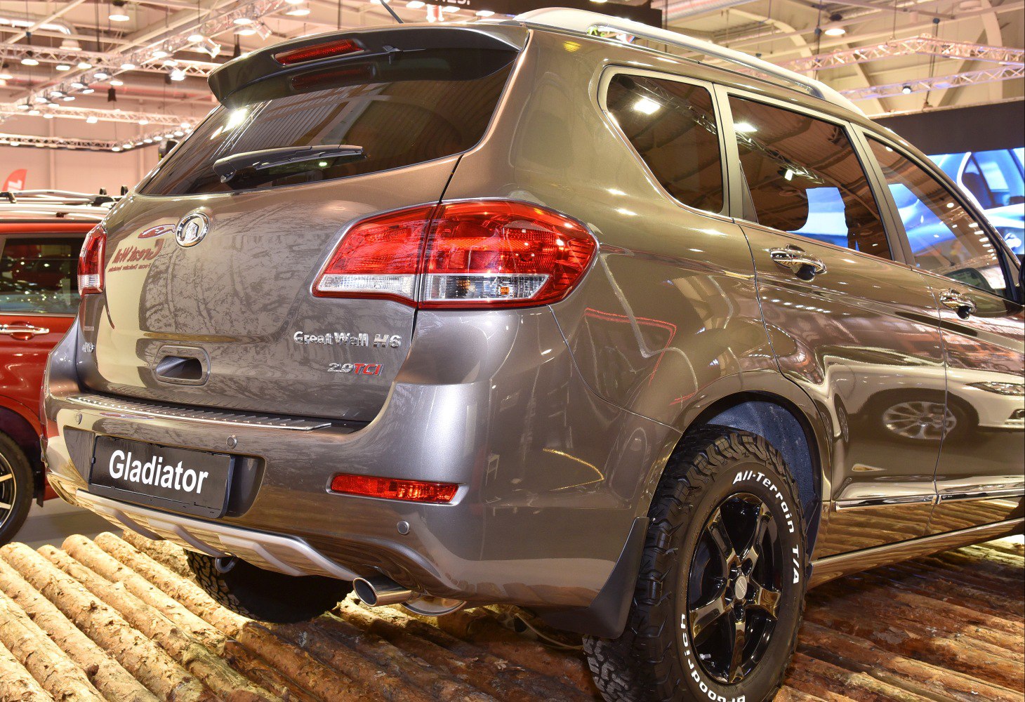 Rear view of SUV with all-terrain tires and distinctive rear lights