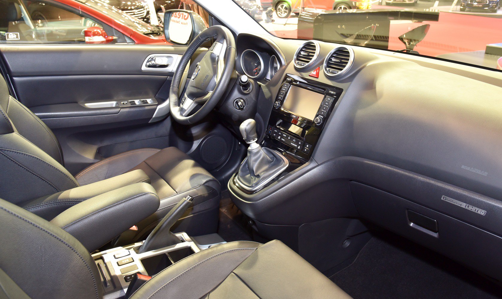 Interior dashboard and center console with steering wheel and gear shift