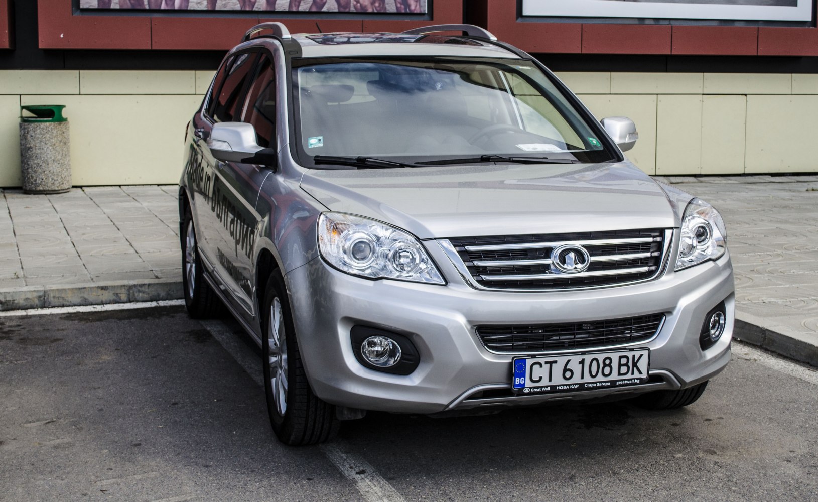 Silver SUV front with grille and headlights