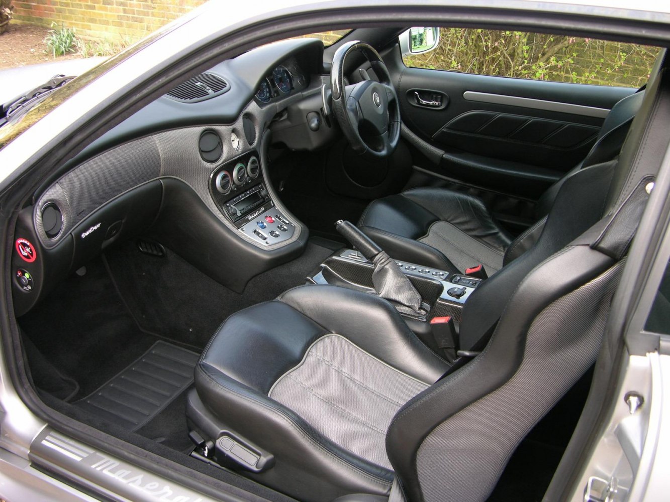 Sporty leather seats and dashboard with advanced controls