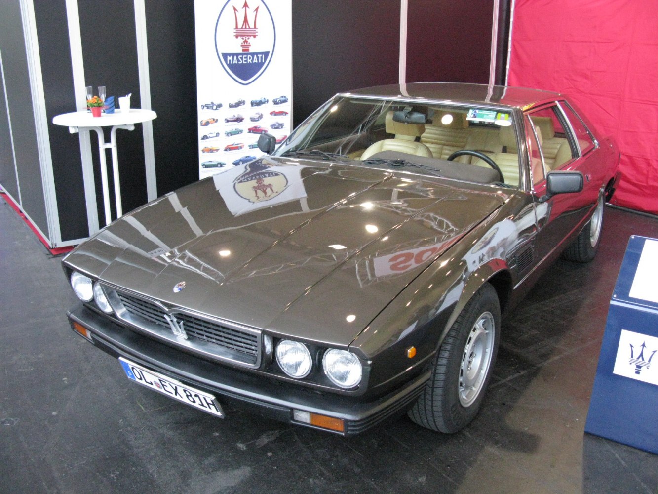 Front view with quad round headlights and sleek hood design