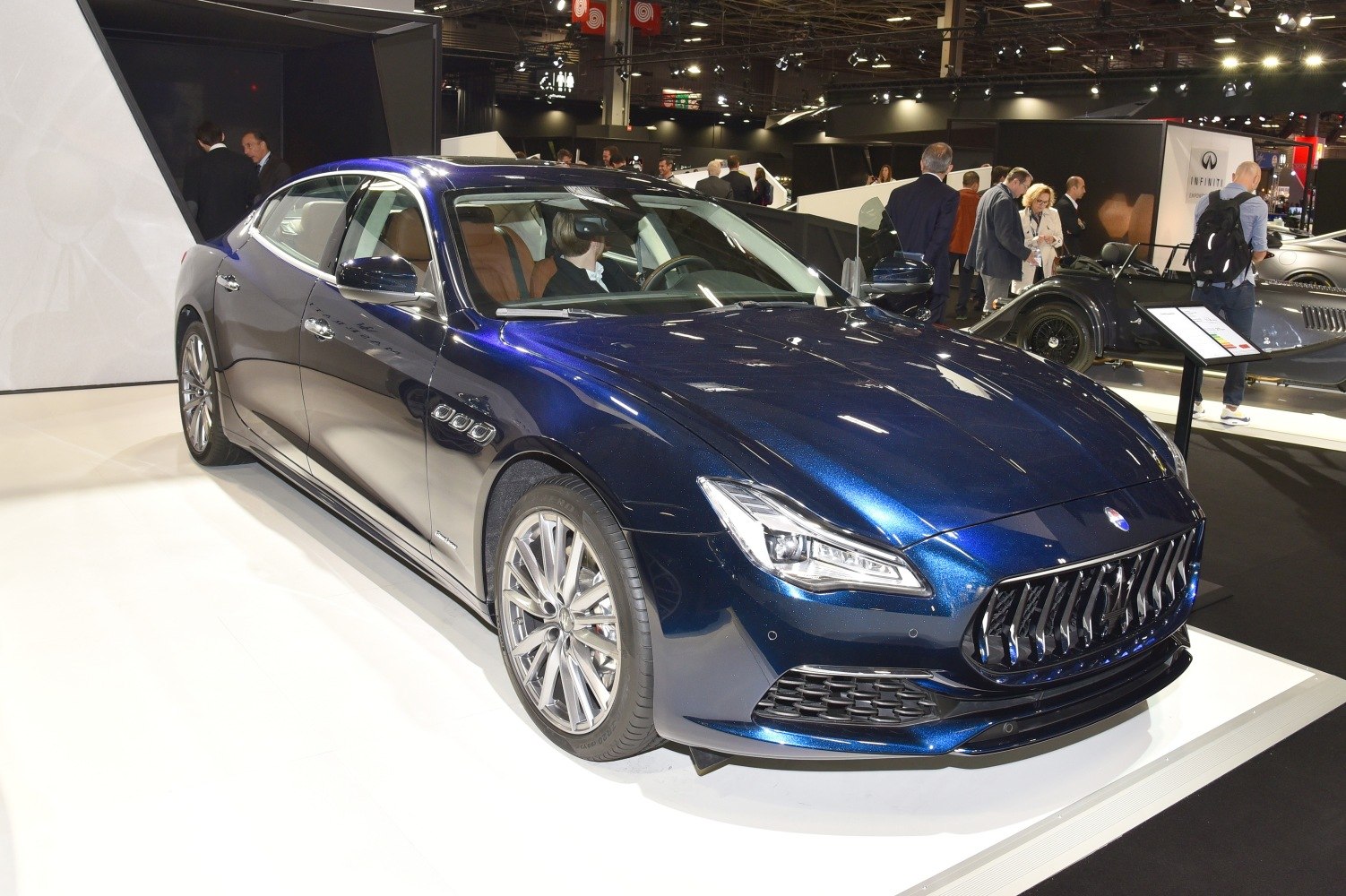 Luxury sedan with sharp front grille and sleek design