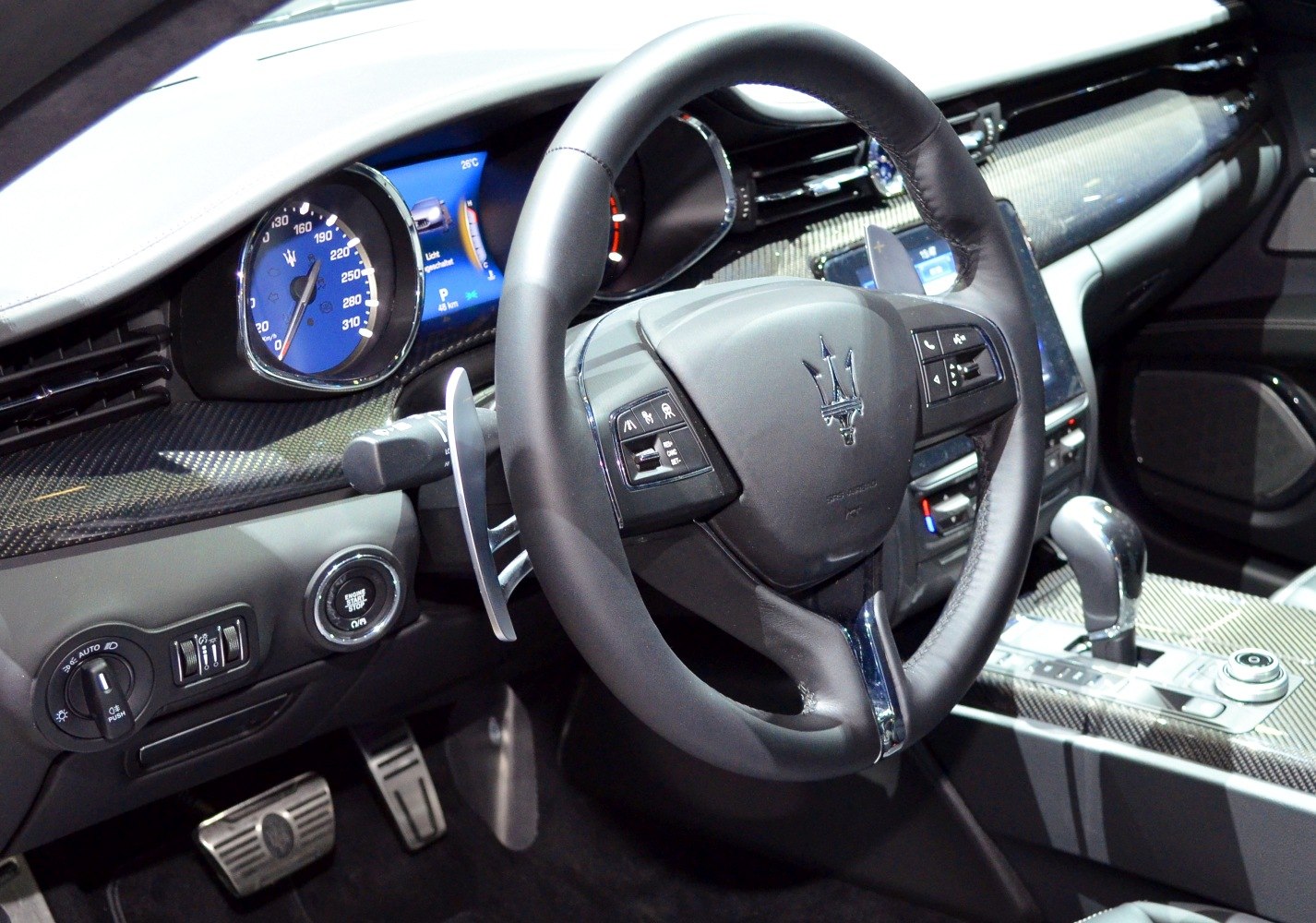 Luxury steering wheel, digital dashboard, carbon fiber interior trim