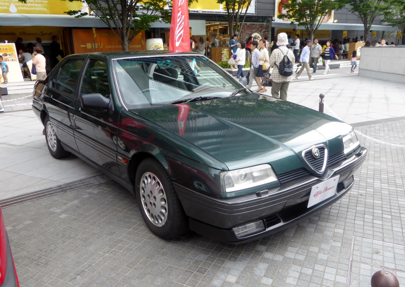Front and side view of vintage sedan with distinctive grille