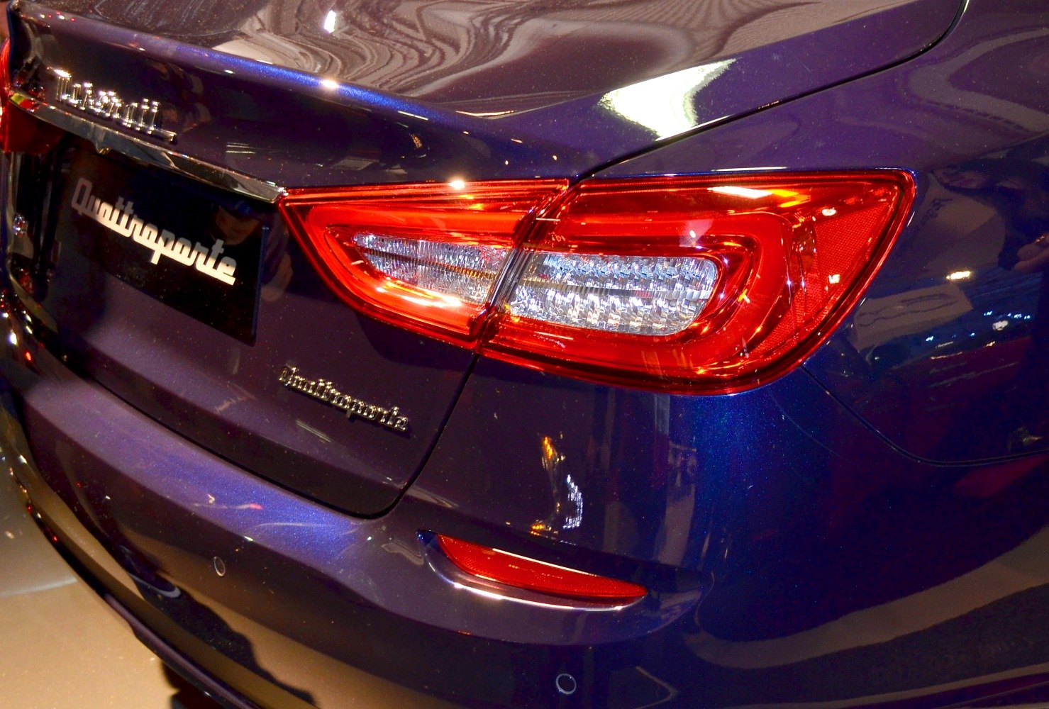 Rear taillight and Quattroporte badge on luxury sedan