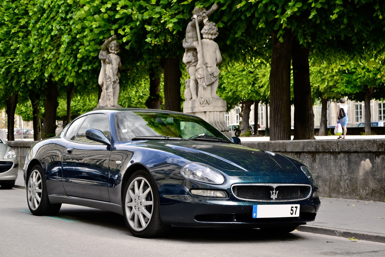 Sleek coupe with iconic front grille and aerodynamic body.